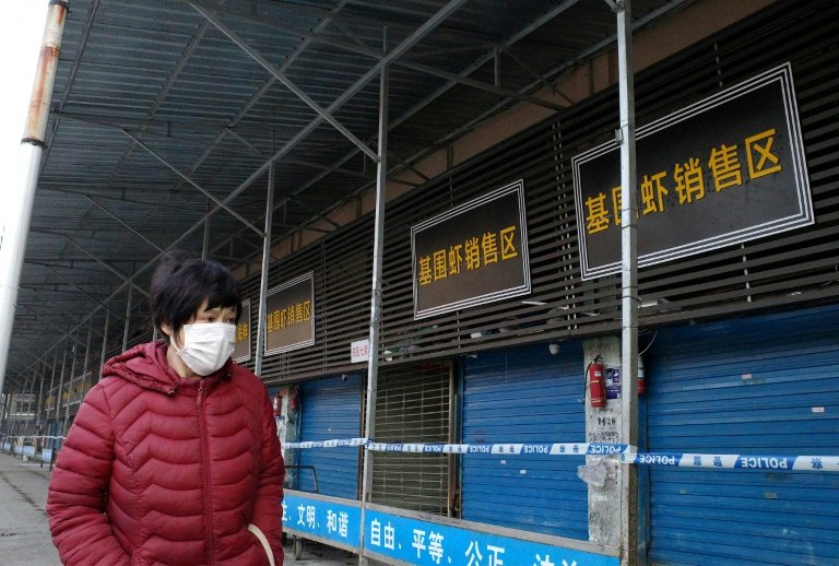 Virus: un 3e mort, l'épidémie touche les grandes villes de Chine